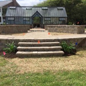 formal English greenhouse with pizza oven, brick herringbone pattern floor, raised beds, walkway, patio and fountain feature - Beaufort