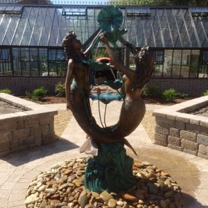 formal English greenhouse with pizza oven, brick herringbone pattern floor, raised beds, walkway, patio and fountain feature - Beaufort